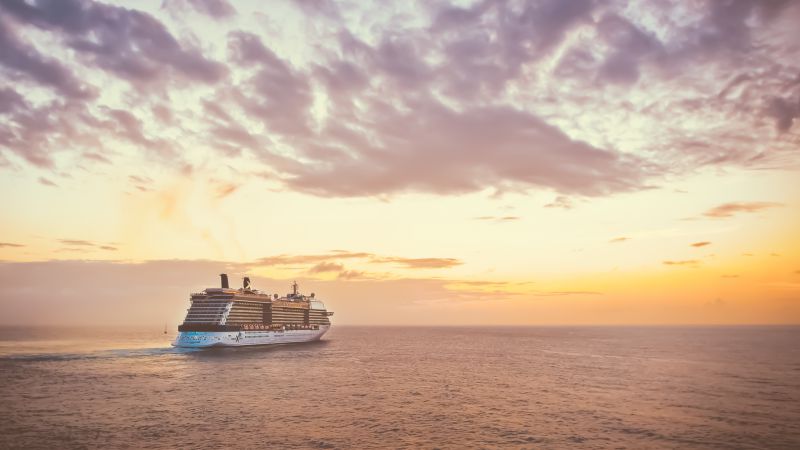 Photo “Cruise Ship Sailing Into A Colorful Sunset” by Ed Gregory